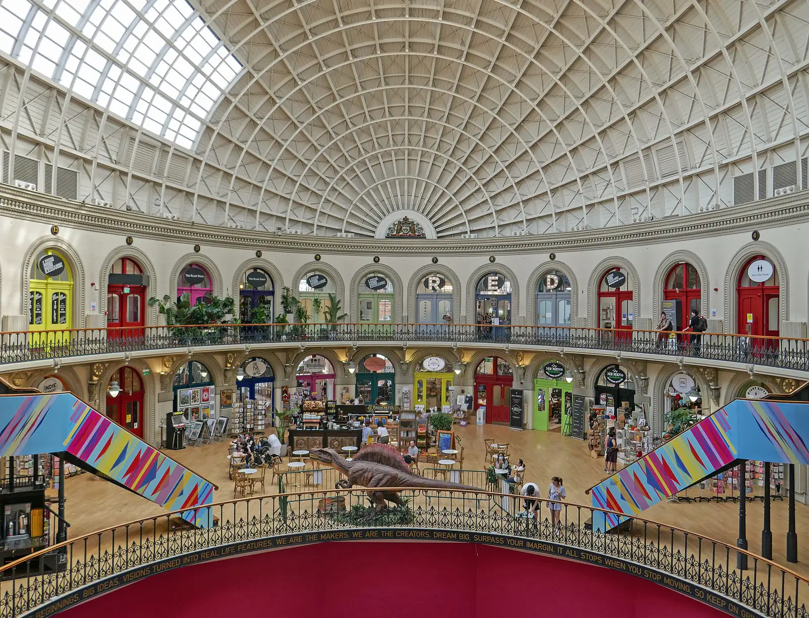 The domed interior of the Leeds Corn Exchange, with shops around a circular balcony
