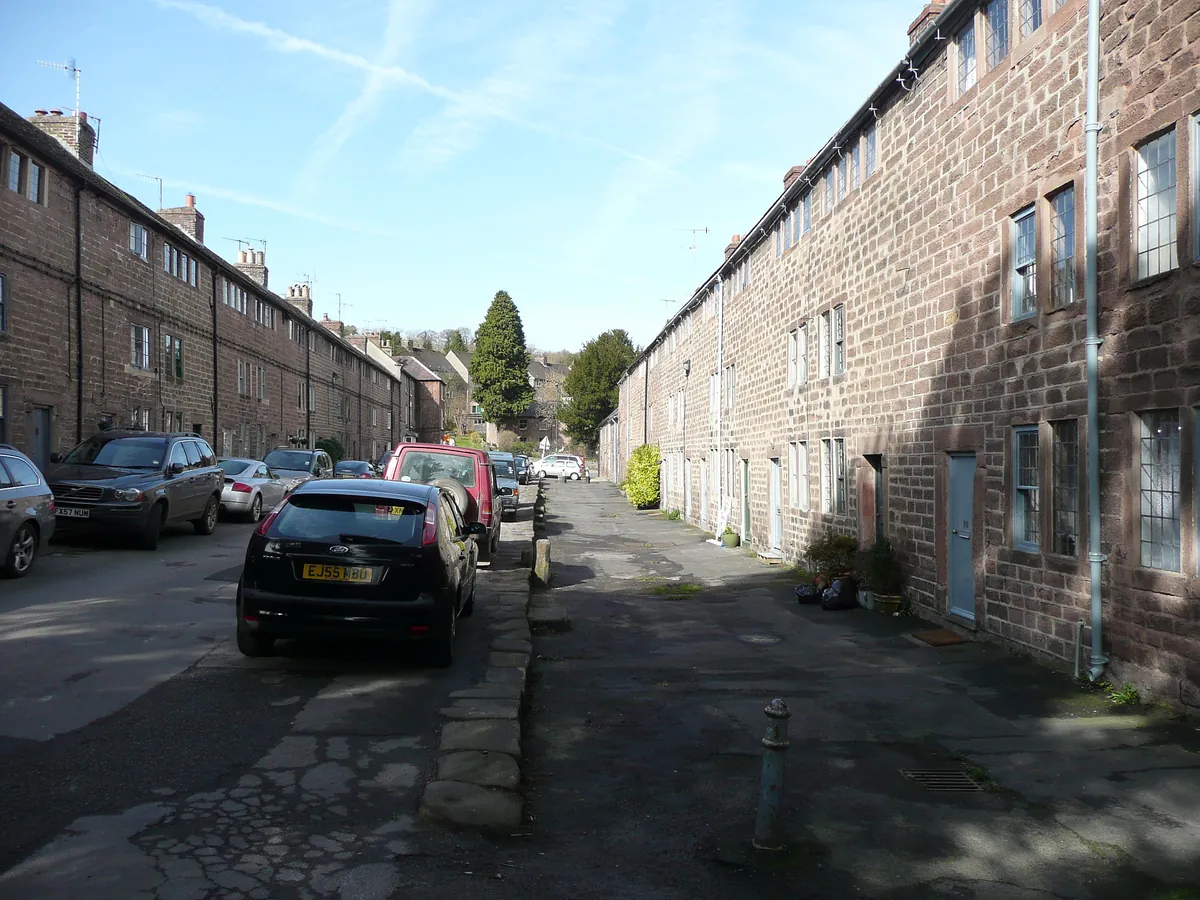 Long rows of gritstone mill workers' houses on North Street in Cromford
